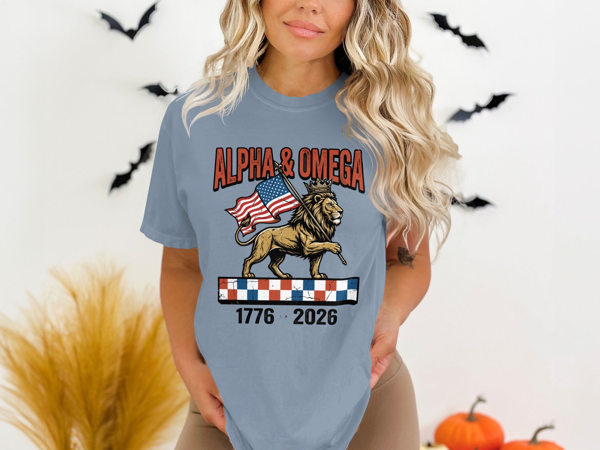 Lion with American flag, "Alpha & Omega" text, and checkered band.
