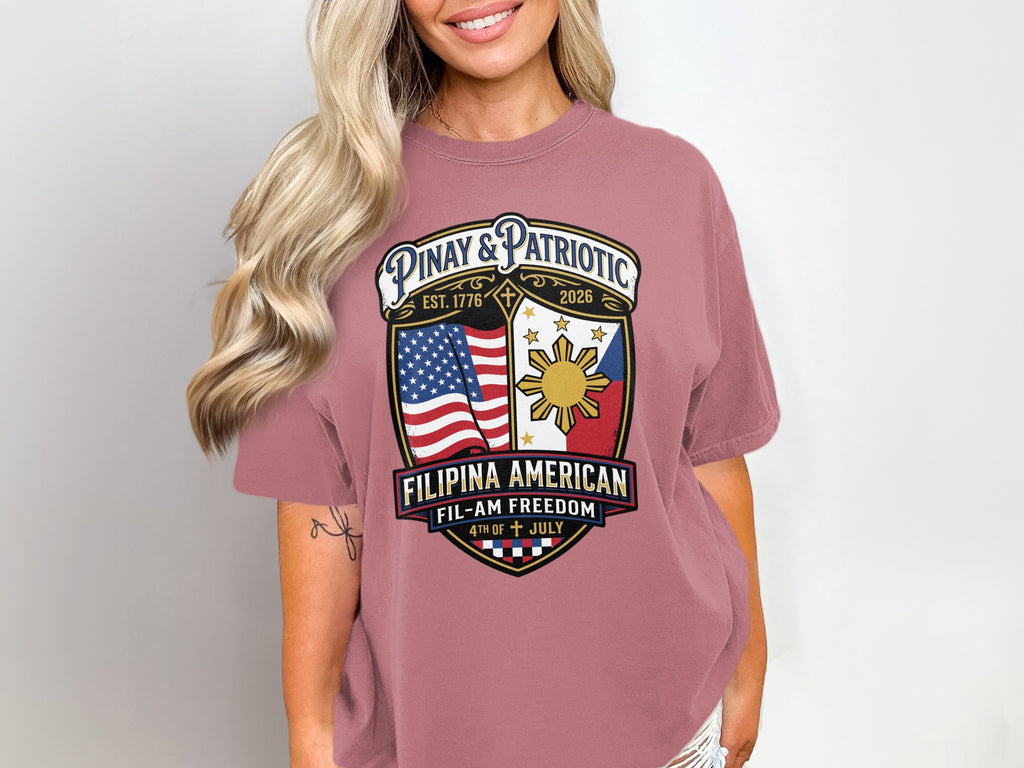 Pink t-shirt with Filipina American flag shield logo and text.