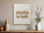 "Rooted in faith" text on canvas art, flanked by two decorative vases.