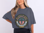 Dark grey t-shirt with "Rejoice in Hope" circular emblem and Roman 12:12 scripture.