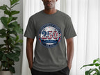 Grey t-shirt featuring circular "250 United States of America Semiquincentennial Est. 1776" graphic.