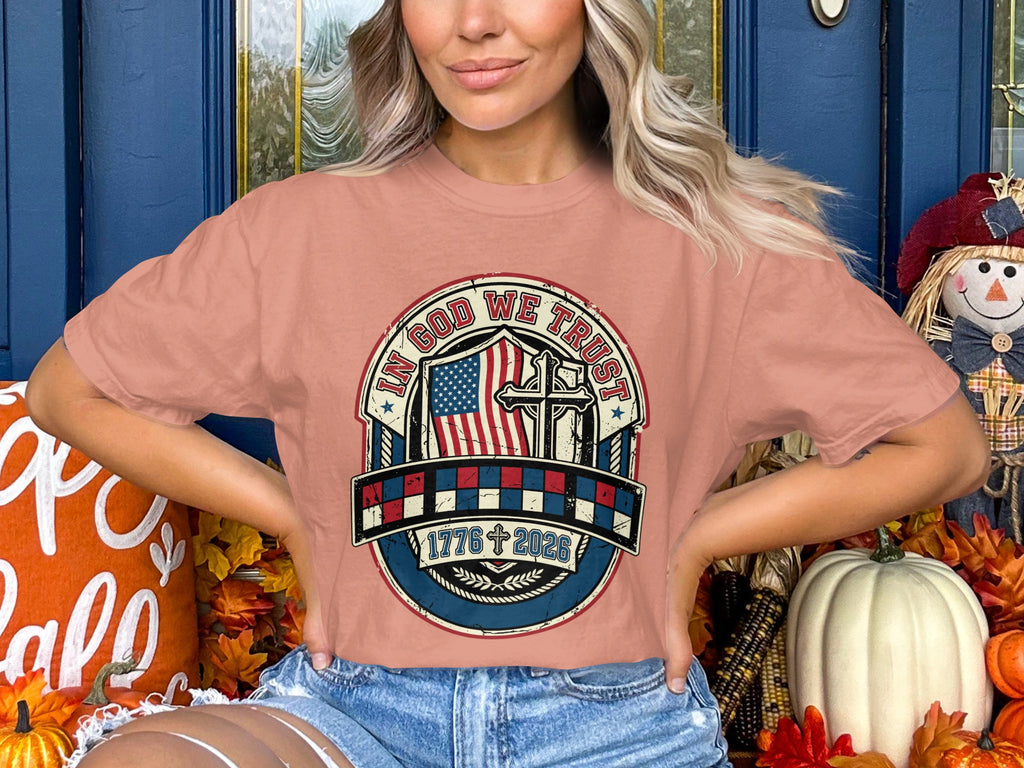 Circular graphic with US flag, cross, and "In God We Trust" text.