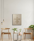 Canvas wall art with text "He restores my soul" above two chairs and small tables.
