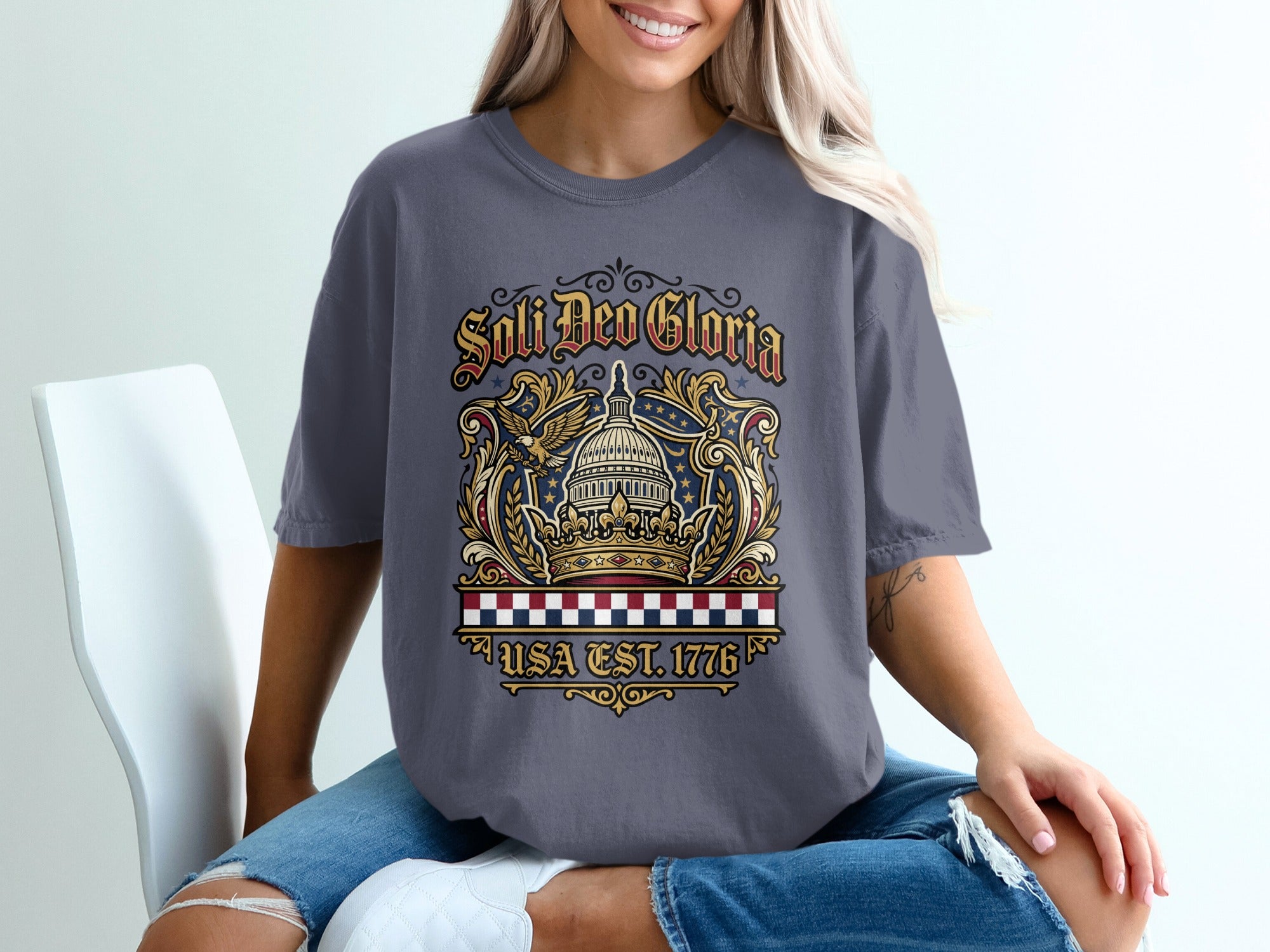 T-shirt with crown, eagle, and "Soli Deo Gloria USA EST. 1776" text.