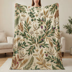 Blanket with a botanical pattern of olive branches, doves, fish, and crosses.