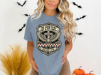 Light blue t-shirt with shield emblem, USA EST 1776, cross, wings, and eagle.