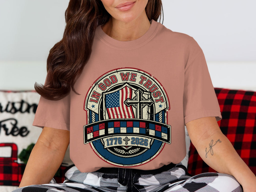 T-shirt with patriotic graphic: "In God We Trust" and US flag.
