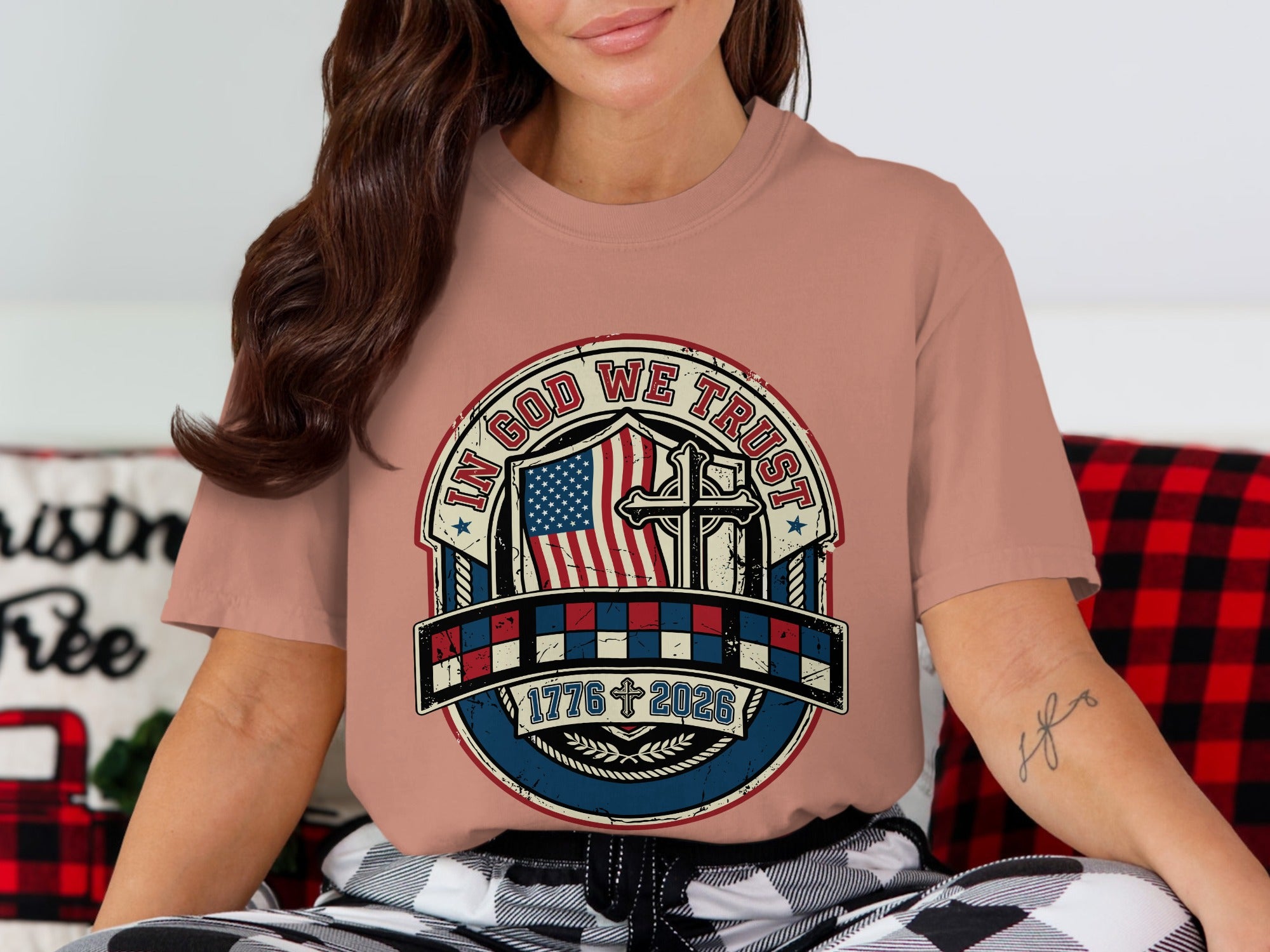 T-shirt with patriotic graphic: "In God We Trust" and US flag.
