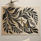 Beige textile with black and gold floral pattern and pearl accents.