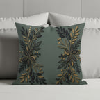 Dark green decorative pillow with gold and black floral branches.
