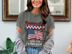 Gray t-shirt with American flag and text "Running the Race for the Kingdom 1776-2026".