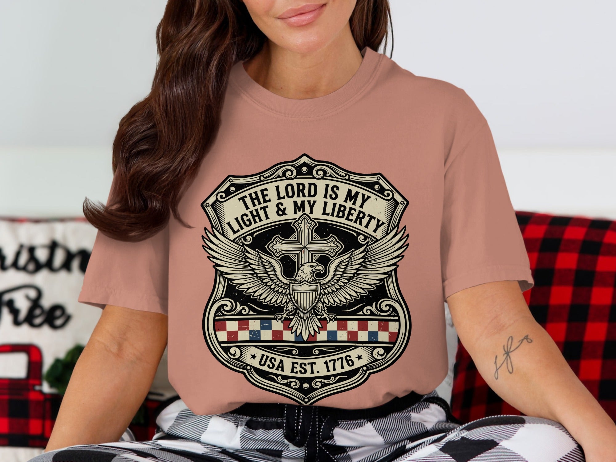 Shield graphic with eagle, cross, and USA flag, bearing "The Lord is My Light & My Liberty USA Est. 1776".
