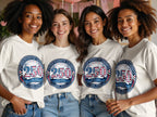 Four women in t-shirts celebrating the United States Semiquincentennial.