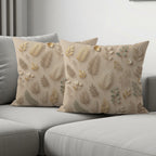 Light beige decorative throw pillows with raised floral and leaf patterns.