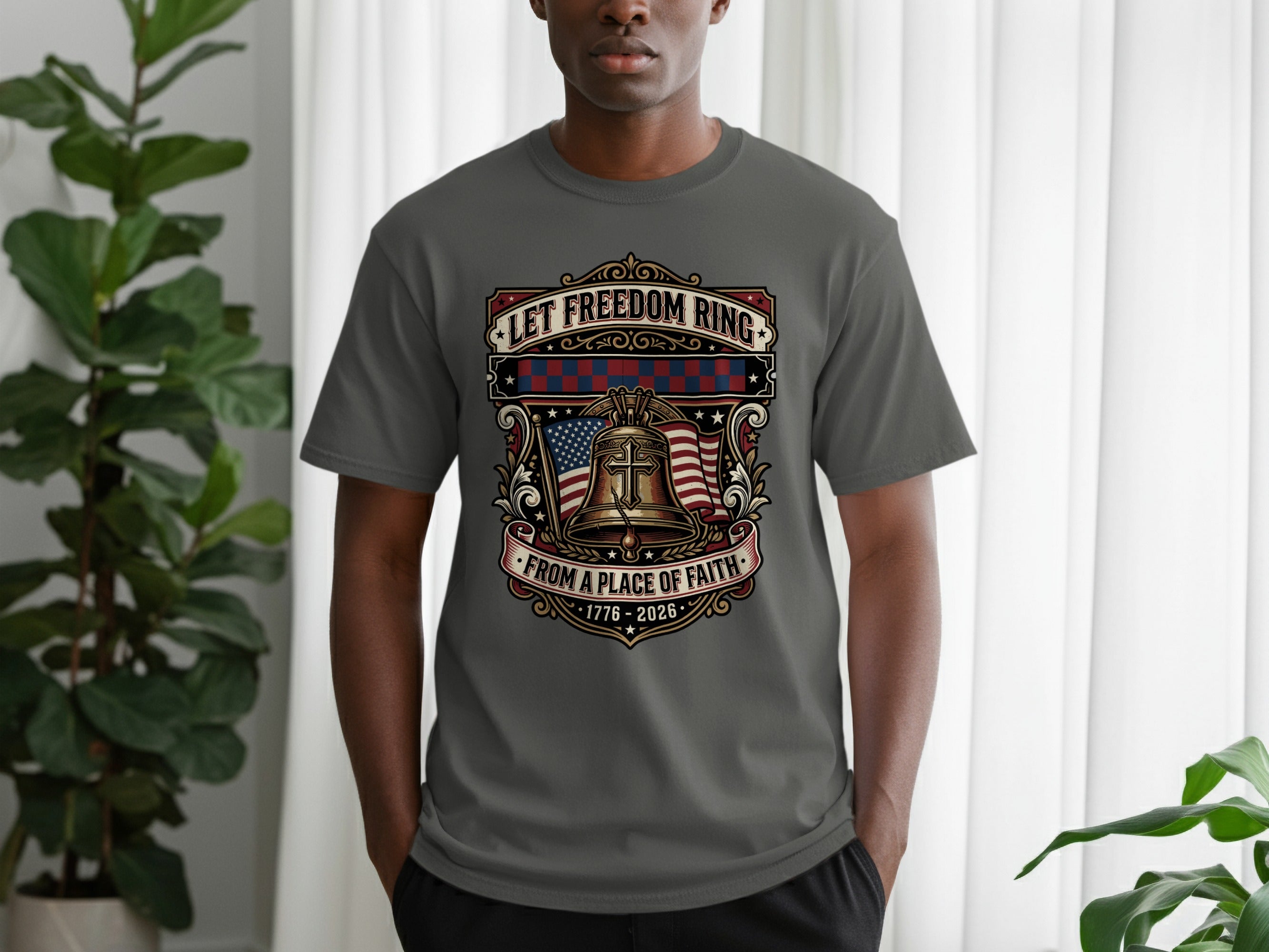 Grey t-shirt with "Let Freedom Ring" and American flag bell graphic.