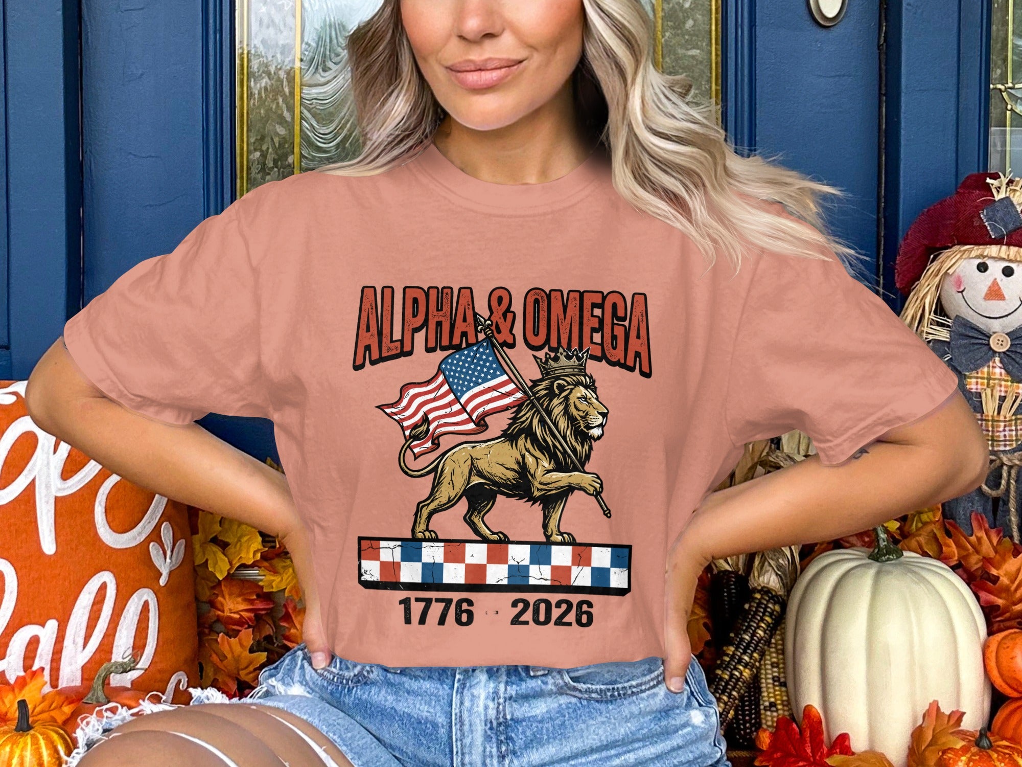 Lion wearing a crown and carrying an American flag, with "Alpha & Omega" and dates.