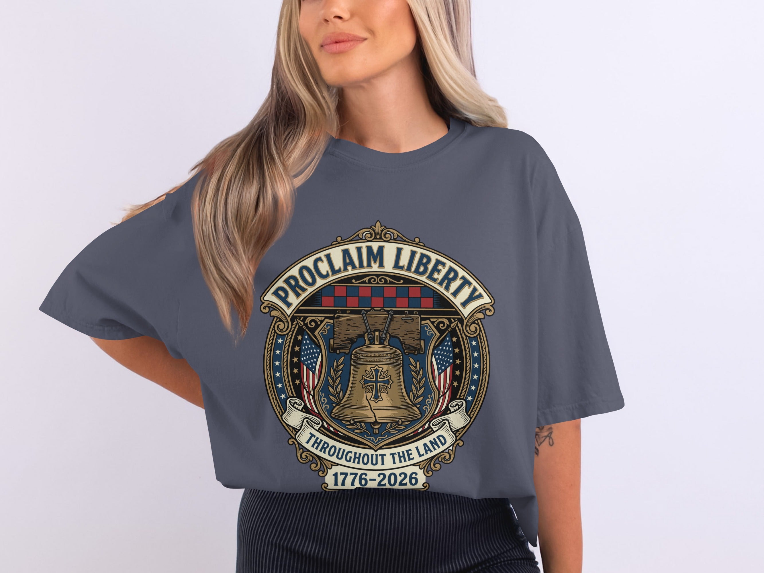 T-shirt with "Proclaim Liberty Throughout the Land" and a bell design.