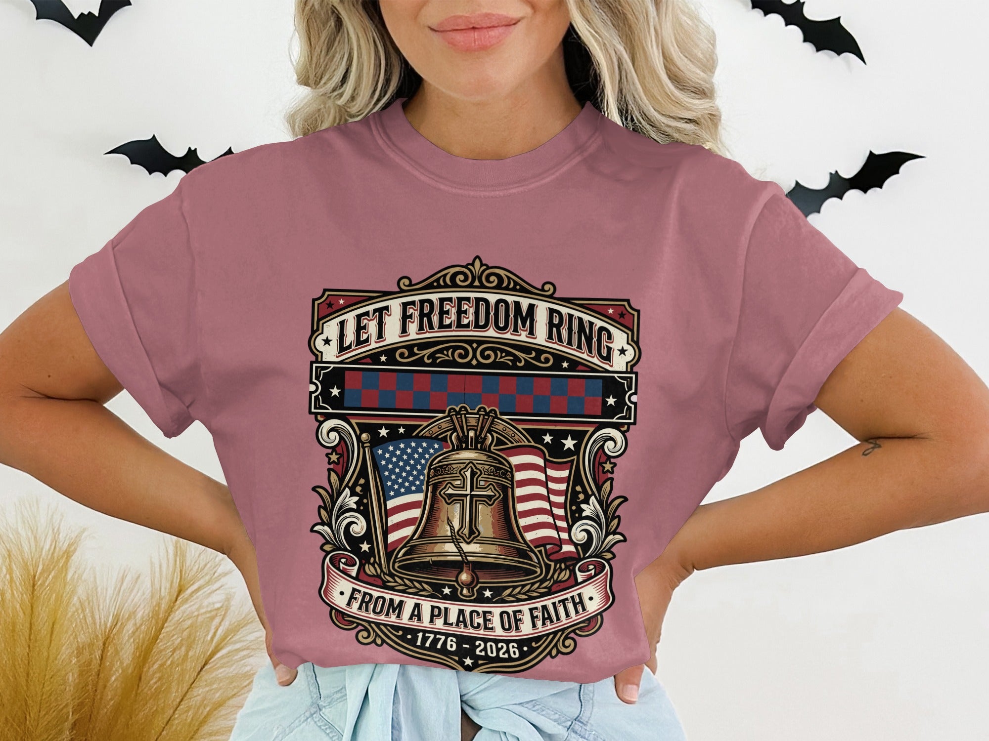 T-shirt graphic with Liberty Bell, US flag, and text "Let Freedom Ring".