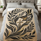 Cream blanket with black and gold floral design and a bird.