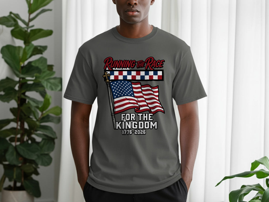Grey t-shirt with American flag and "Running the Race for the Kingdom 1776-2026" text.