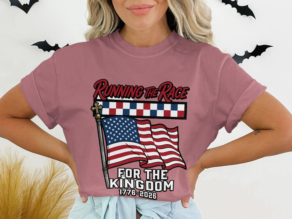 T-shirt graphic with American flag, "Running The Race For The Kingdom 1776-2026".