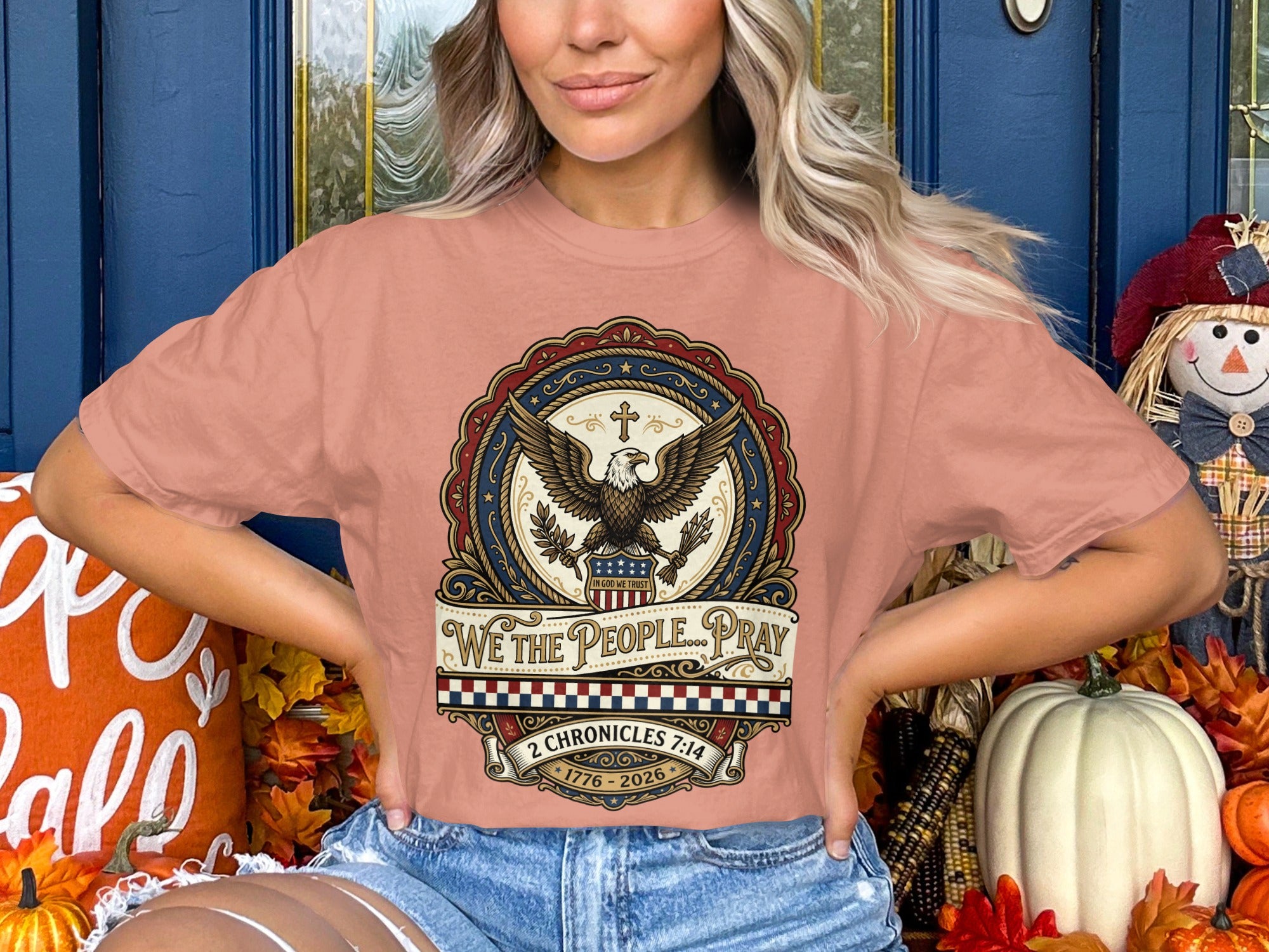 T-shirt with "We the People... Pray" text and an eagle emblem.