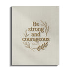 Be strong and courageous Joshua 1:9 gold text with laurel wreath on textured background.