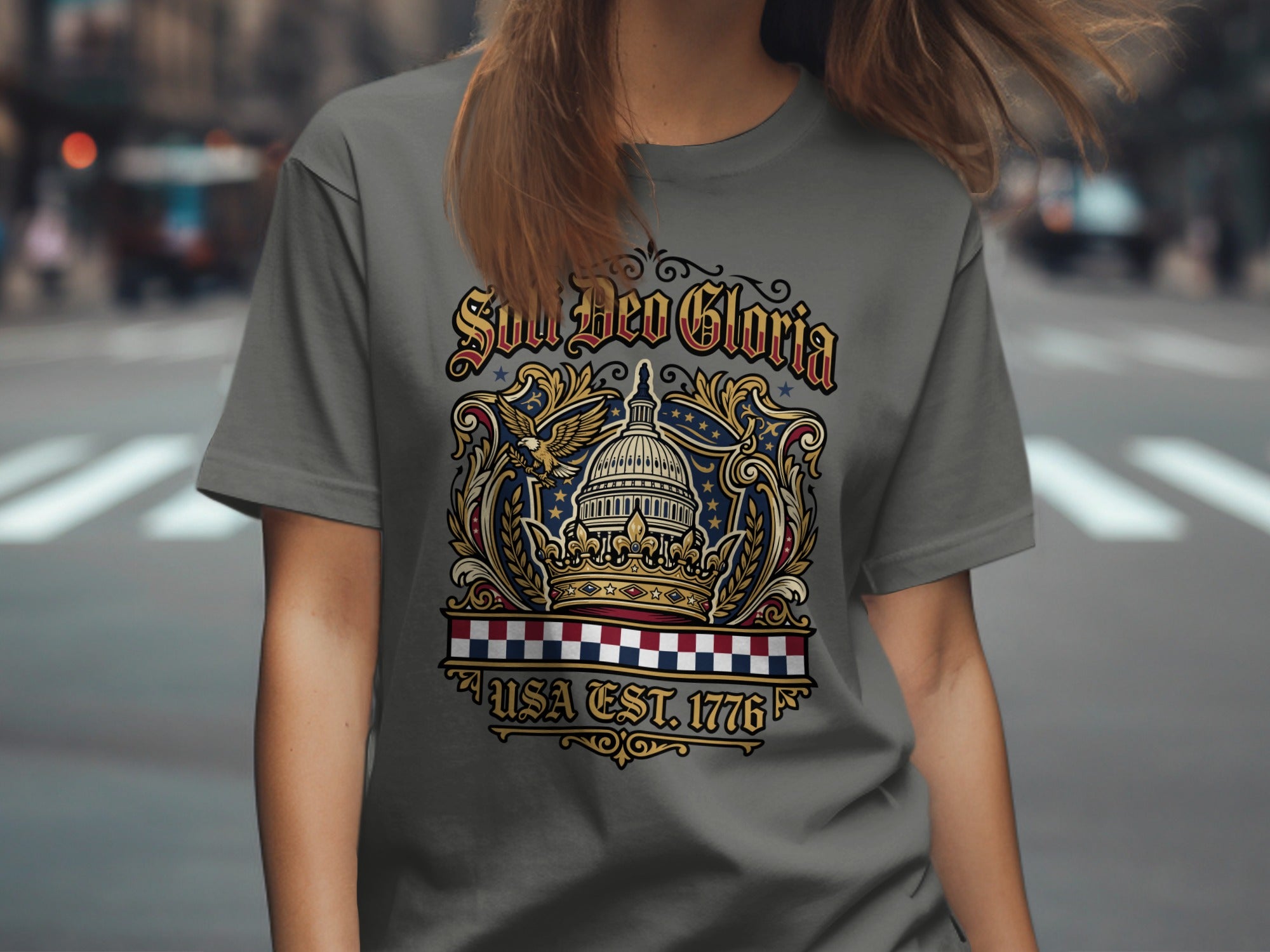 Grey t-shirt with a crest featuring a crown, eagle, and "Soli Deo Gloria USA Est. 1776".