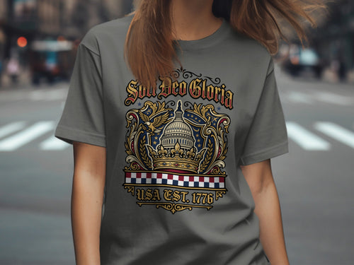 Grey t-shirt with a crest featuring a crown, eagle, and "Soli Deo Gloria USA Est. 1776".