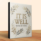 Book cover with gold text "IT IS WELL WITH MY SOUL" and olive branches.