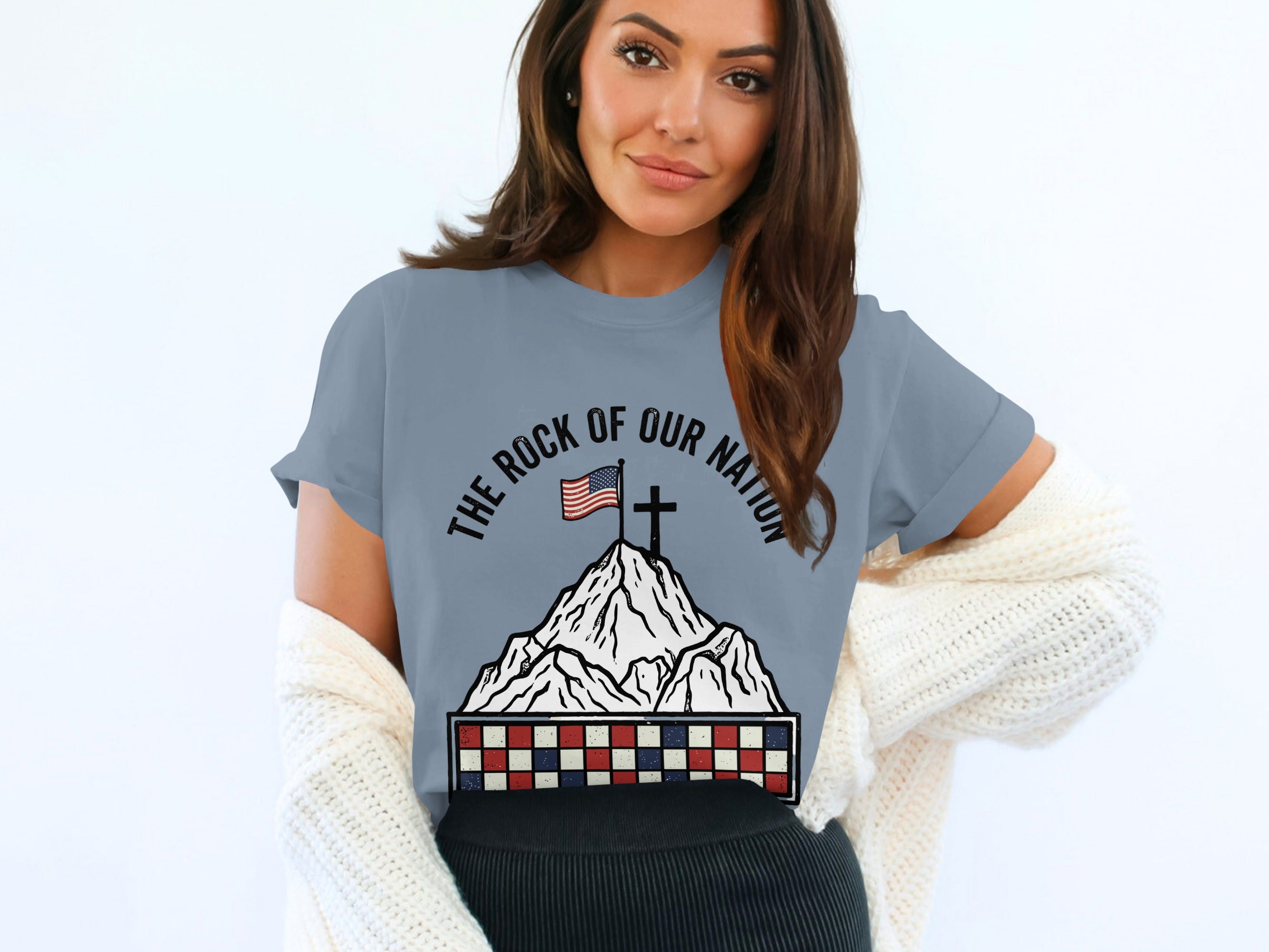 Gray t-shirt with flag on mountain and "The Rock of Our Nation" text.