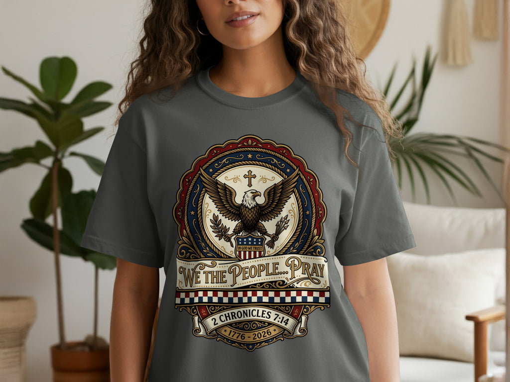 Gray t-shirt with eagle, cross, and "We the People... Pray" text.