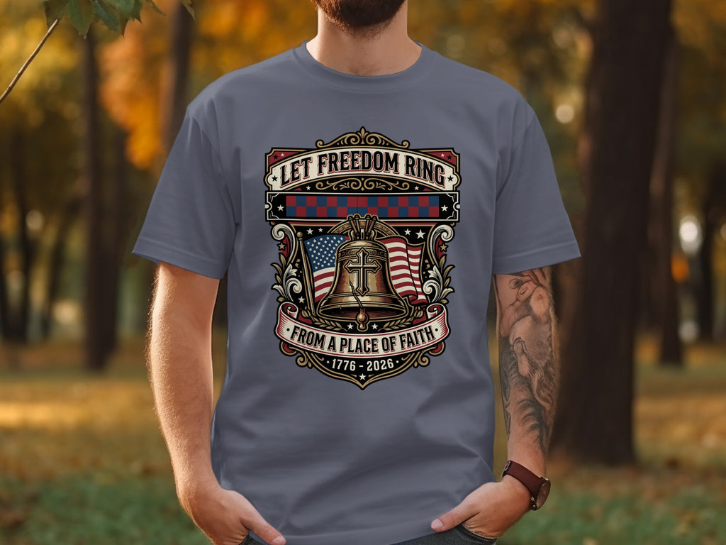 T-shirt with bell, US flag, and text "Let Freedom Ring from a Place of Faith 1776-2026".