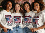 Four women wear white t-shirts with US flags and "Running the Race for the Kingdom 1776-2026".