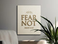 Canvas art with "FEAR NOT ISAIAH 41:10" text and a leafy branch.