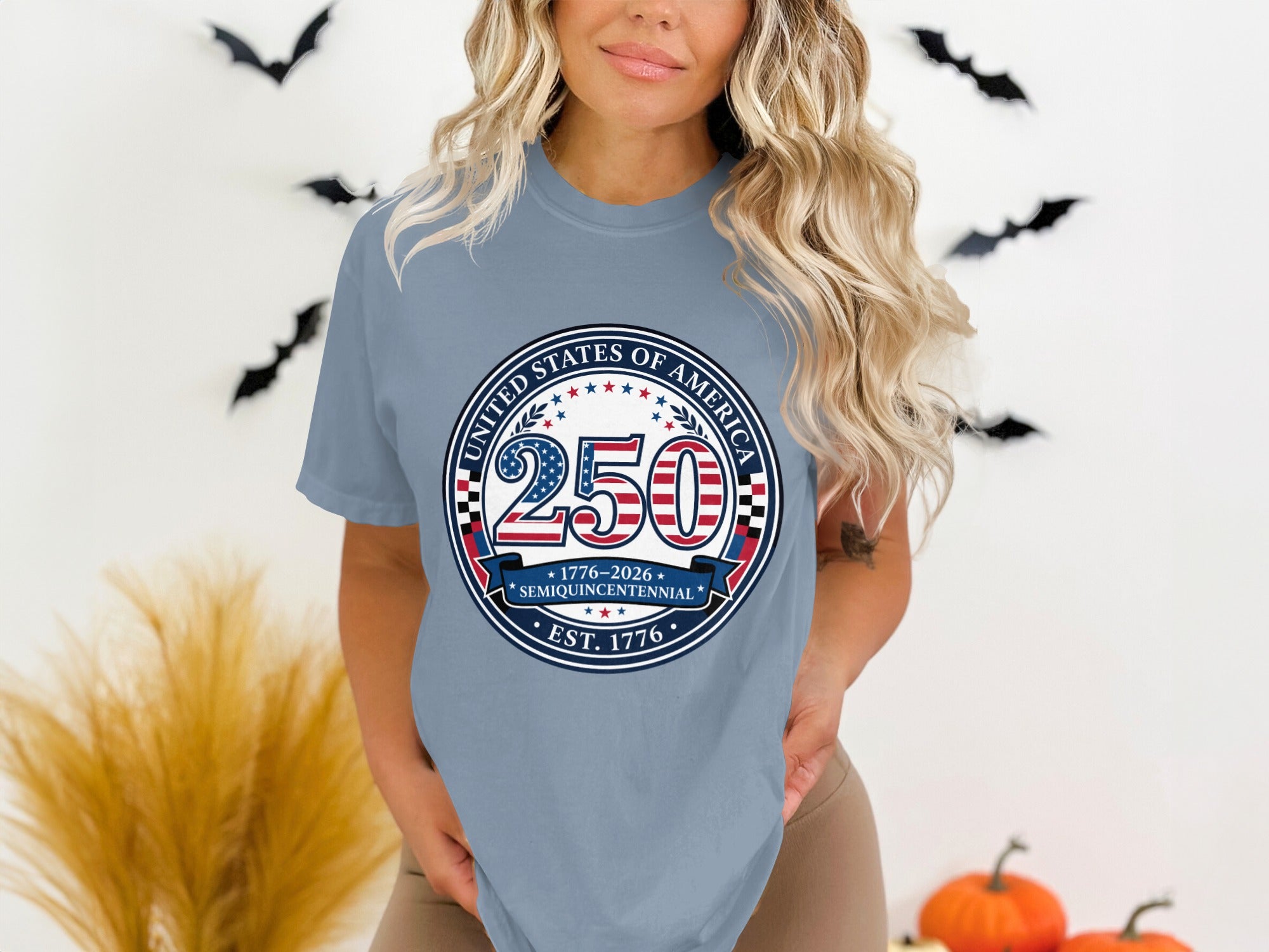 Blue t-shirt with "United States of America 250 Semiquincentennial 1776-2026" seal.