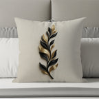 Light beige throw pillow with a raised black and gold leaf design.