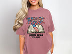 T-shirt with "The truth shall set you free" and Bible verse.