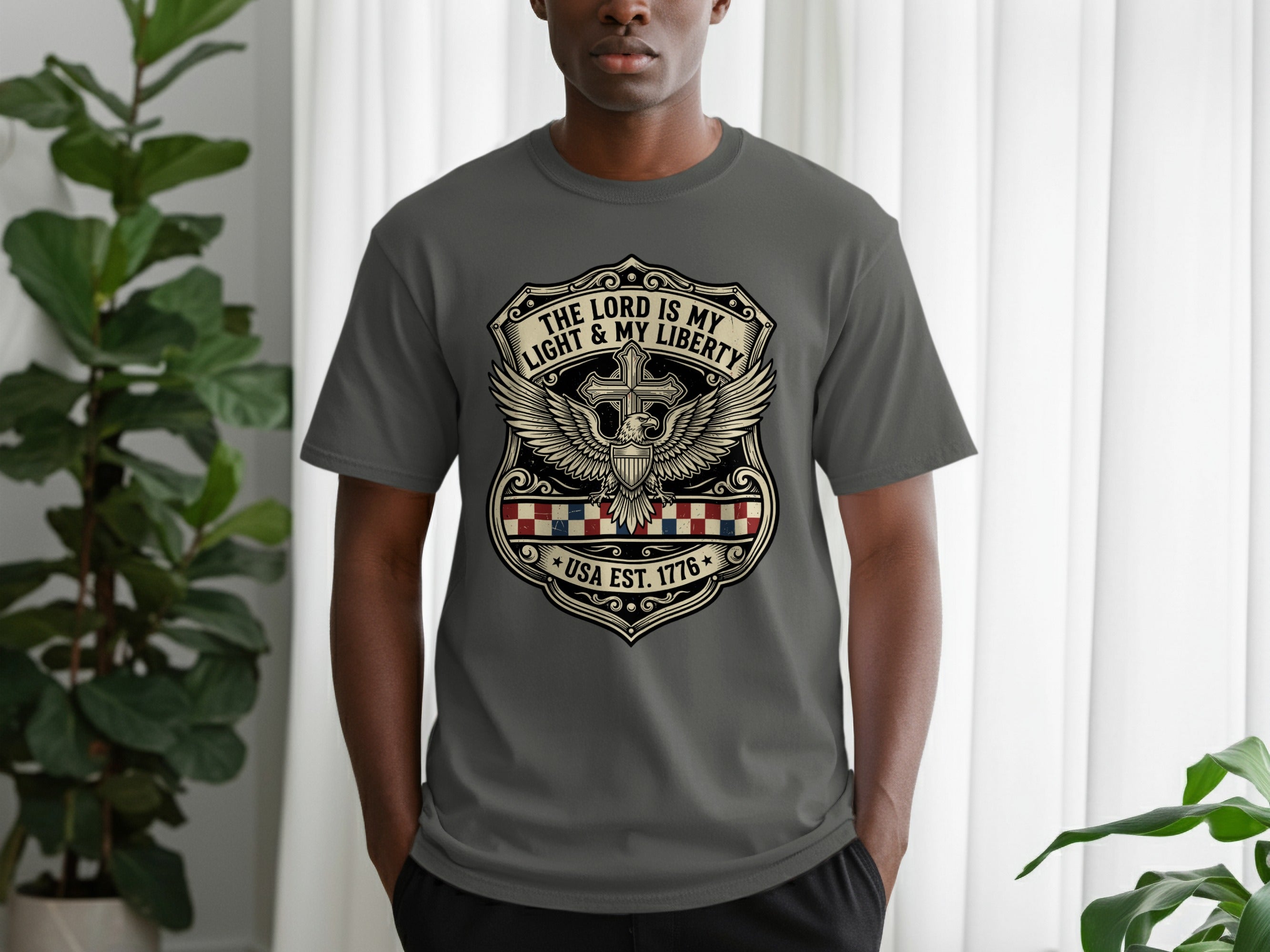 Gray t-shirt with "The Lord is My Light and Liberty" shield logo.