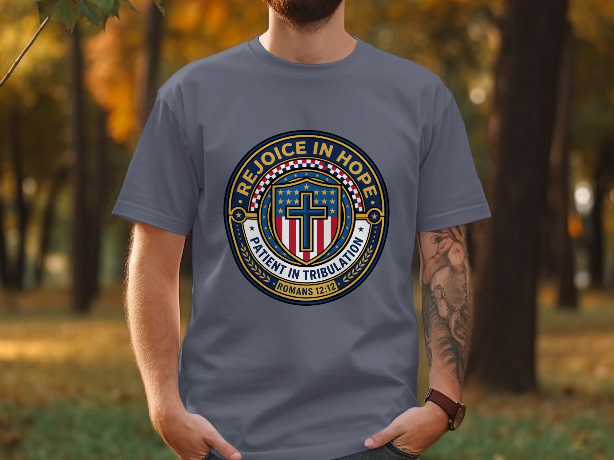 Gray t-shirt with "Rejoice in Hope" circular logo and Romans 12:12.