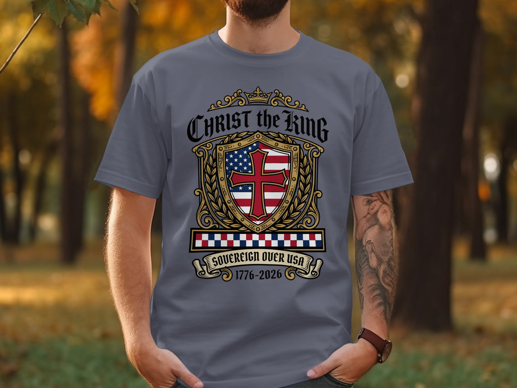 Grey t-shirt with "Christ the King Sovereign Over USA 1776-2026" and a shield emblem.