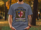 Grey t-shirt with "Christ the King Sovereign Over USA 1776-2026" and a shield emblem.