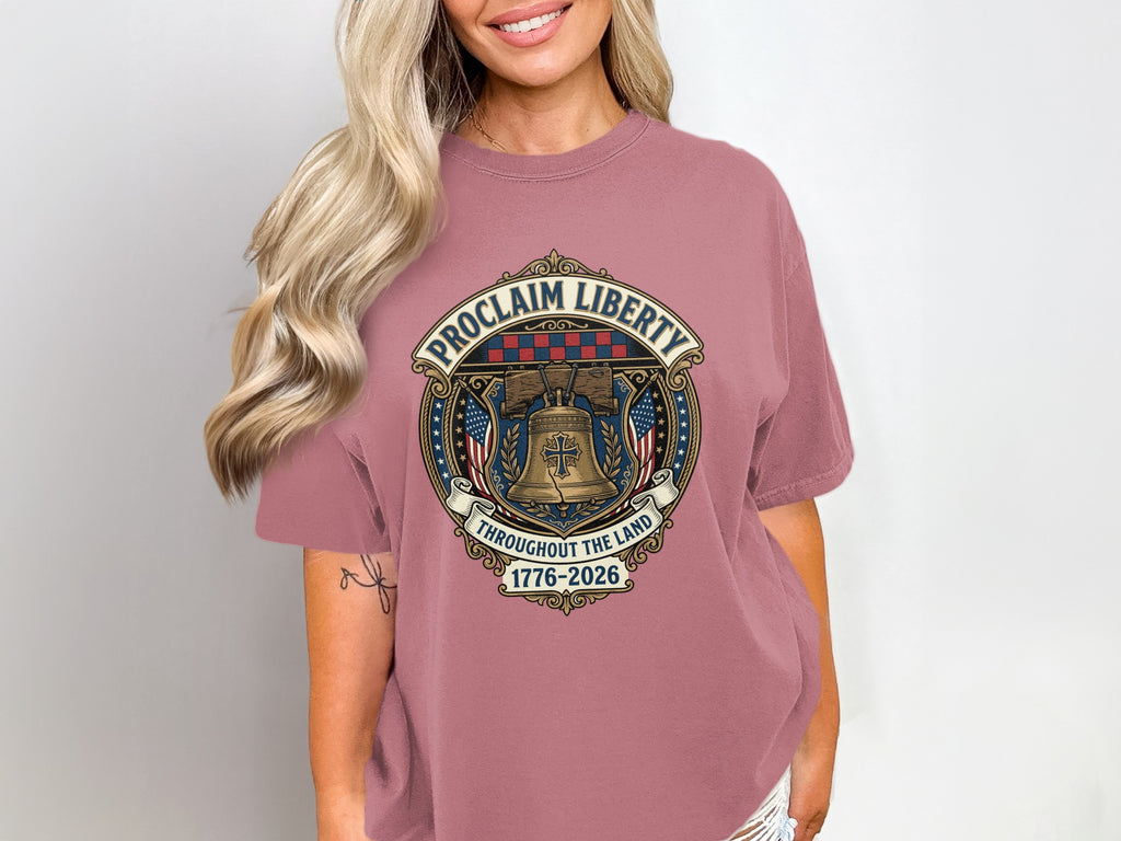 T-shirt with "Proclaim Liberty" and Liberty Bell design, celebrating 1776-2026.