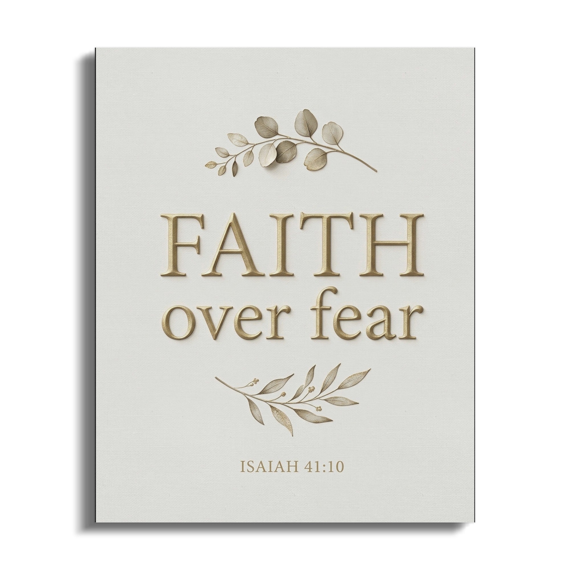Canvas art with "FAITH over fear" and "ISAIAH 41:10" text, adorned with leaves.