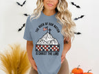 T-shirt with mountains, flag, cross, and text "The Rock of Our Nation Is Christ the Lord."
