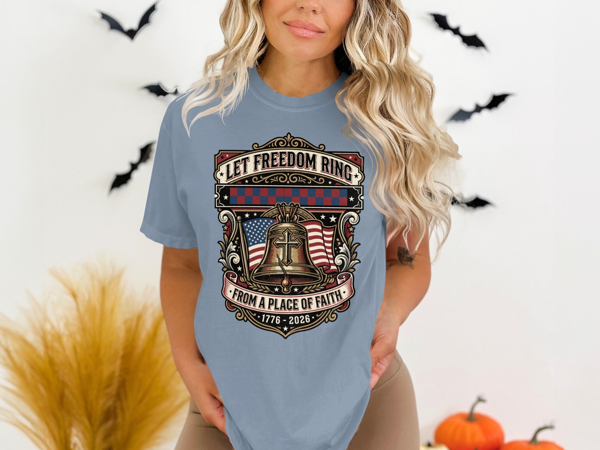 T-shirt with patriotic bell, flag, and text "Let Freedom Ring".