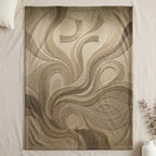 Textured blanket with embossed cross and fish symbols.