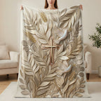 Gold cross with doves and wheat stalks on a textured blanket.
