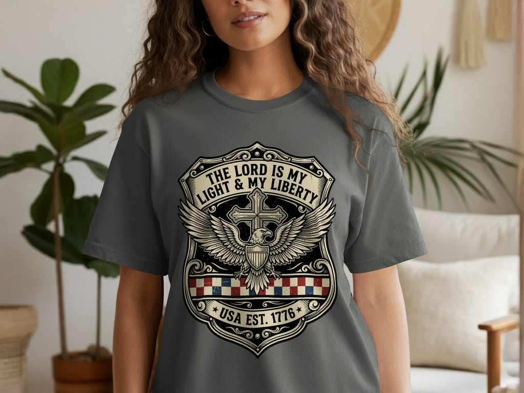 Dark grey t-shirt with "The Lord is my light & my liberty" crest.