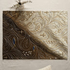 Brown and gold embroidered tablecloth with crosses, leaves, and fish symbols.